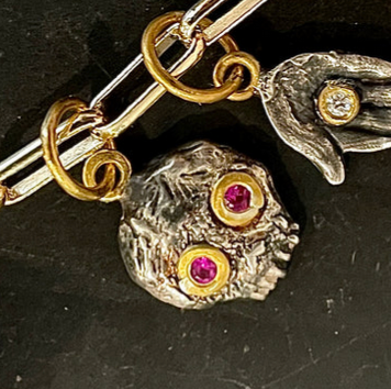 Ruby Eyed Skull Charm